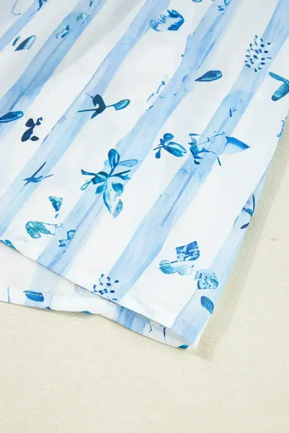 Sky Blue Floral Smocked A-Line Tie Straps Maxi Dress - Femstylo