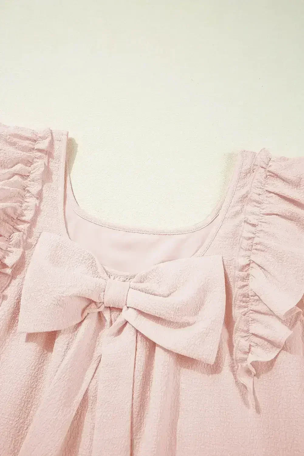 Light Pink Textured Flutter Sleeve Square Neck Bow Back Mini Dress - Femstylo