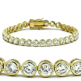 47202 - Gold Brass Bracelet with AAA Grade CZ in Clear - Femstylo