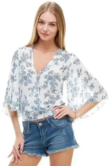 LONG SLEEVE SURPLICE FLORAL TOP | FEMSTYLO - Femstylo