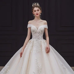 Luxury Off-Shoulder Wedding Dress - Handmade Lace Ball Gown | Femstylo