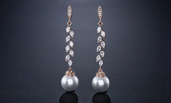 ZAKOL Fashion Round Imitation Pearls Drop Earrings for Women Shinny Zirconia Crystal Leaf Long Bridal Earring Wedding Jewelry