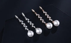 ZAKOL Fashion Round Imitation Pearls Drop Earrings for Women Shinny Zirconia Crystal Leaf Long Bridal Earring Wedding Jewelry