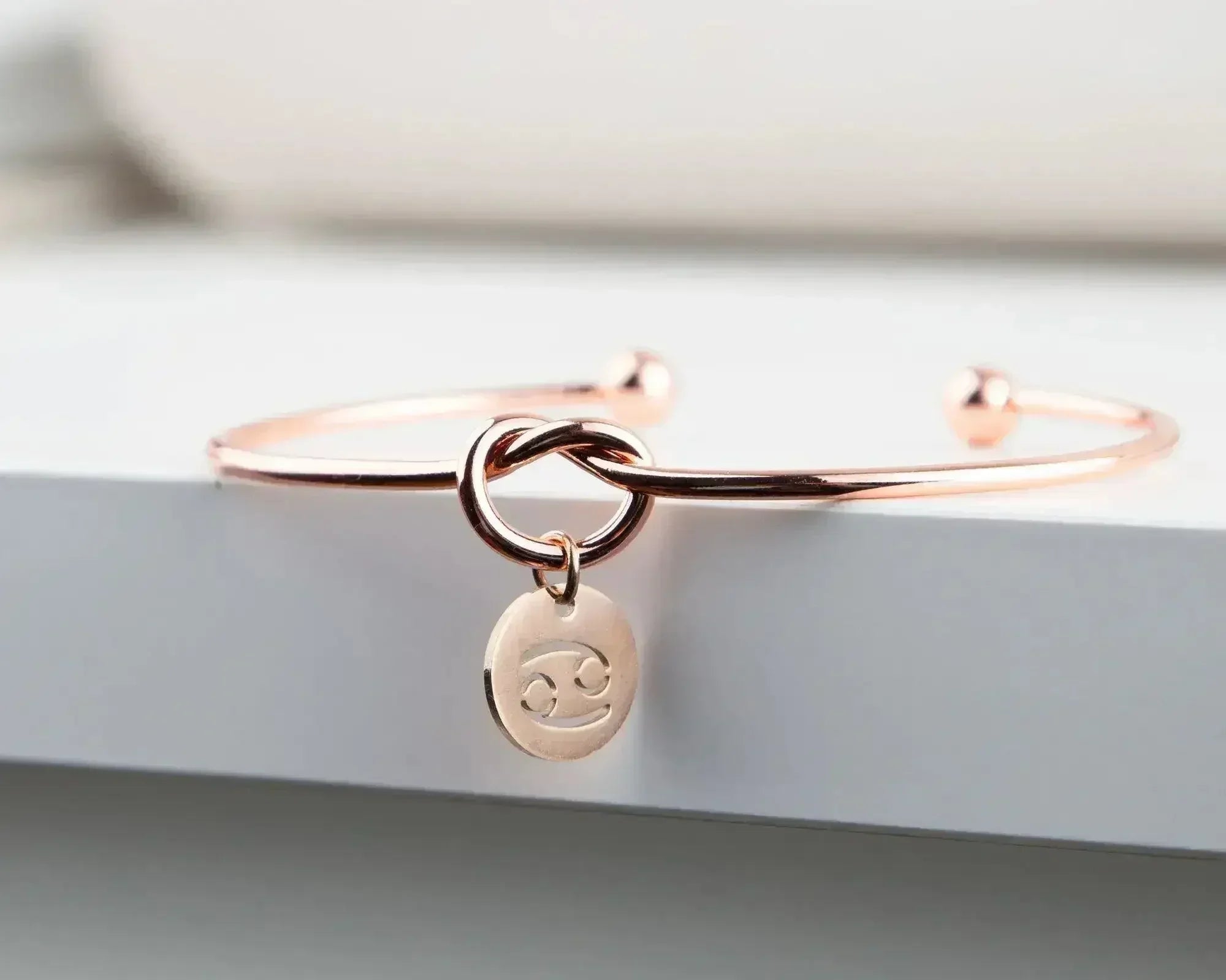 Dainty Knot Bracelet, Rose Gold Plated Wire Knot Bangle with Zodiac - Femstylo