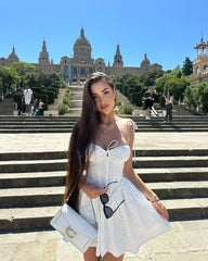 YENKYE Sexy Elegant Women Hollow Out Embroidery Yellow Sling Mini Dress Low Waist Lace Up Bandage Party Dresses Birthday Robe