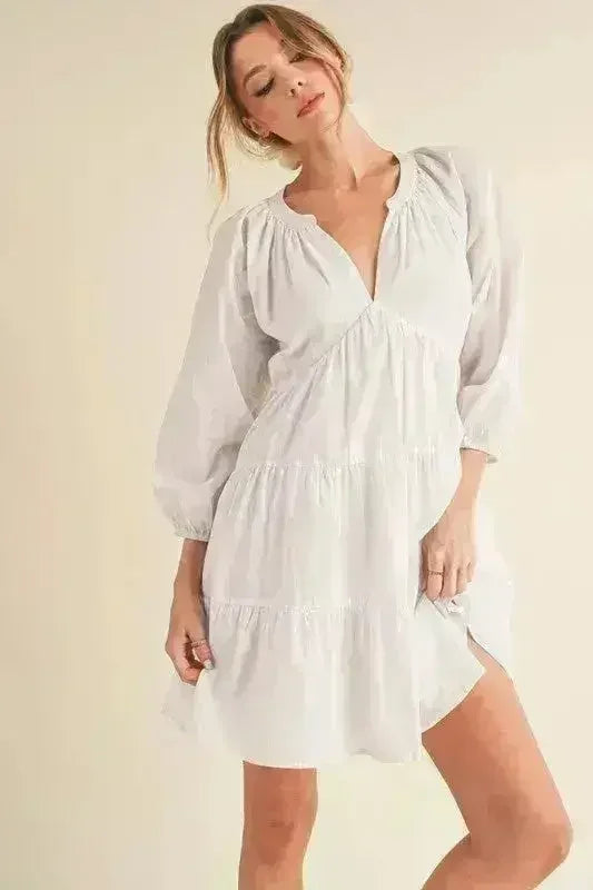 Aemi + Co Notched Balloon Sleeve Tiered Mini Dress - Femstylo