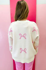 Pink Bow Print Exposed Seam Drop Sleeve Sweater