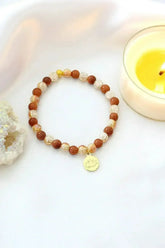 Goldstone Elastic Bracelet | 24K Lotus Flower Charm - Femstylo