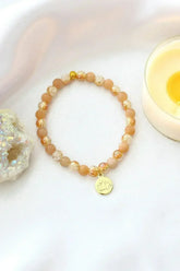 Sunstone Elastic Bracelet | 24K Lotus Flower Charm - Femstylo