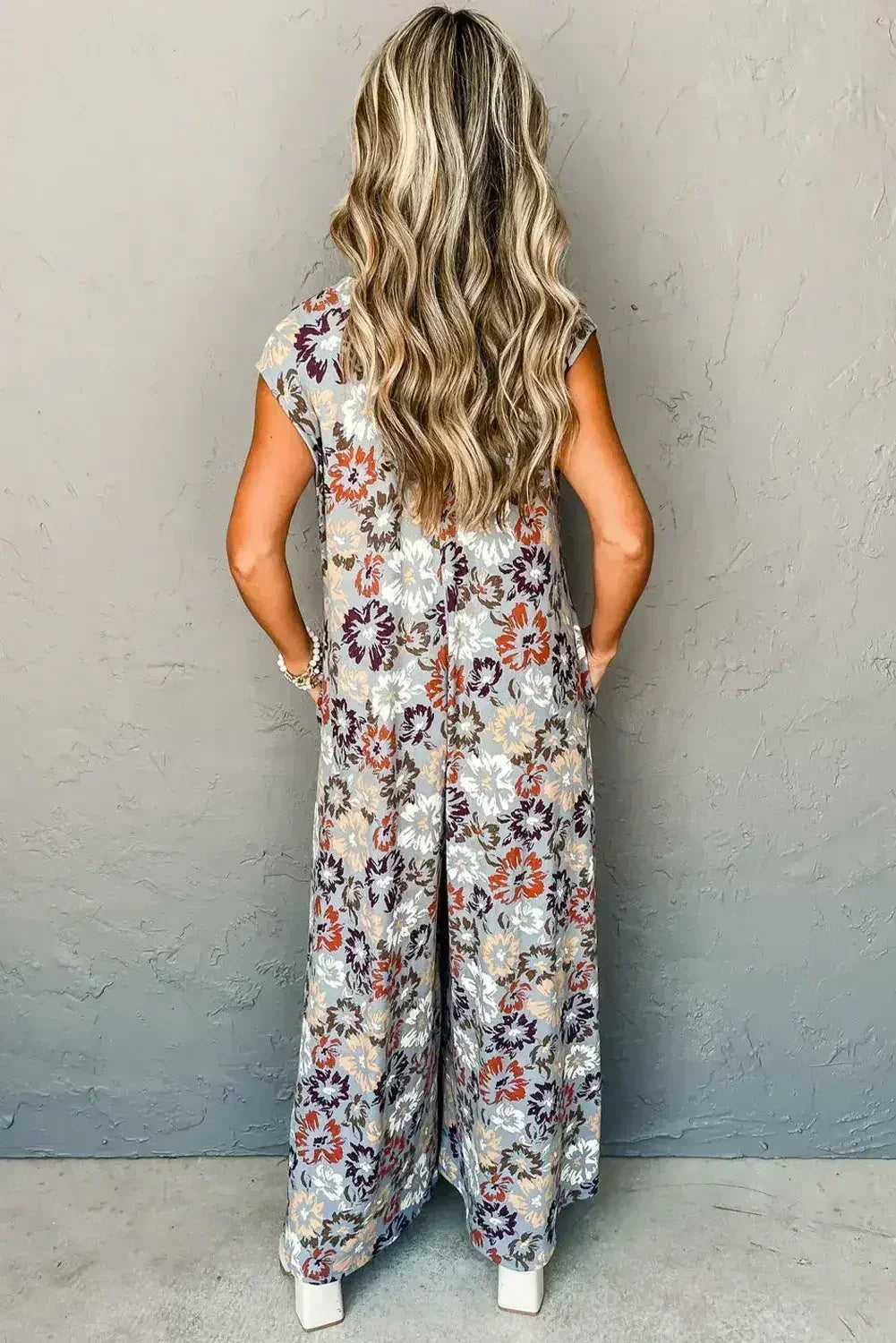 Sky Blue Floral Sleeveless Pocketed Wide Leg Jumpsuit - Femstylo