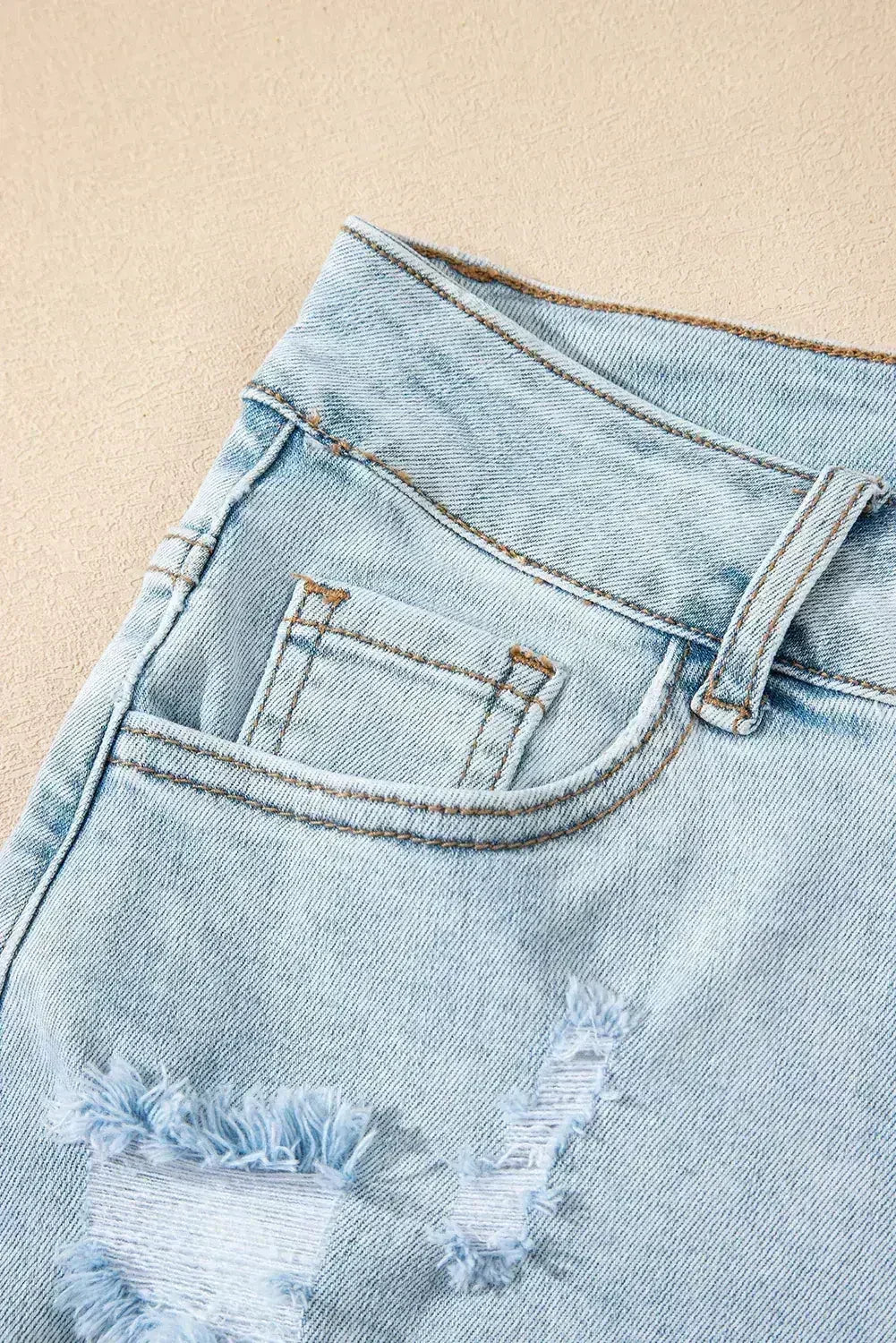 Beau Blue High Rise Distressed Raw Hem Denim Shorts - Femstylo