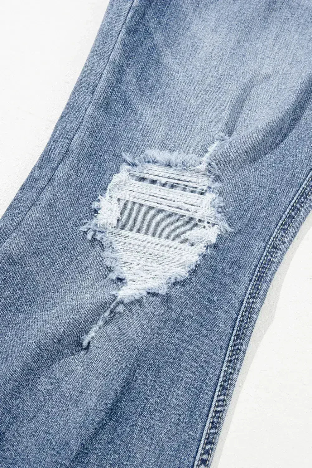 Dusk Blue High Rise Ripped Distressed Hem Flared Jeans - Femstylo