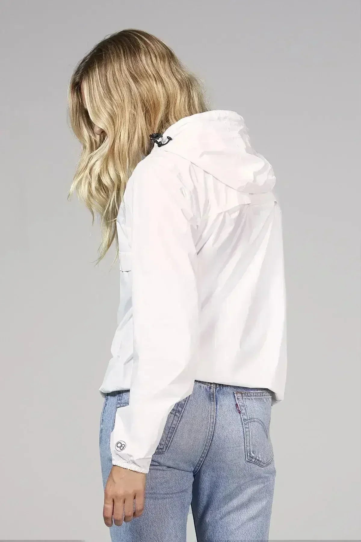 White quarter zip packable rain jacket and windbreaker - Femstylo