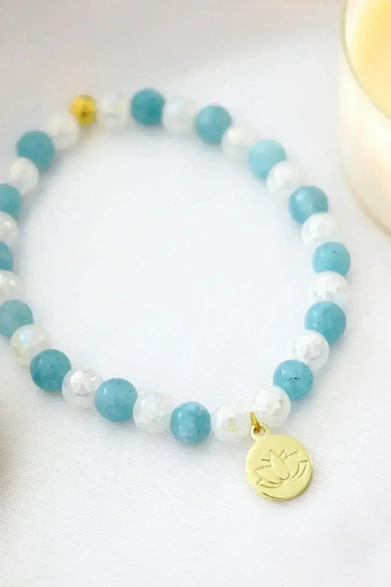 Aquamarine Elastic Bracelet | 24K Lotus Flower Charm - Femstylo