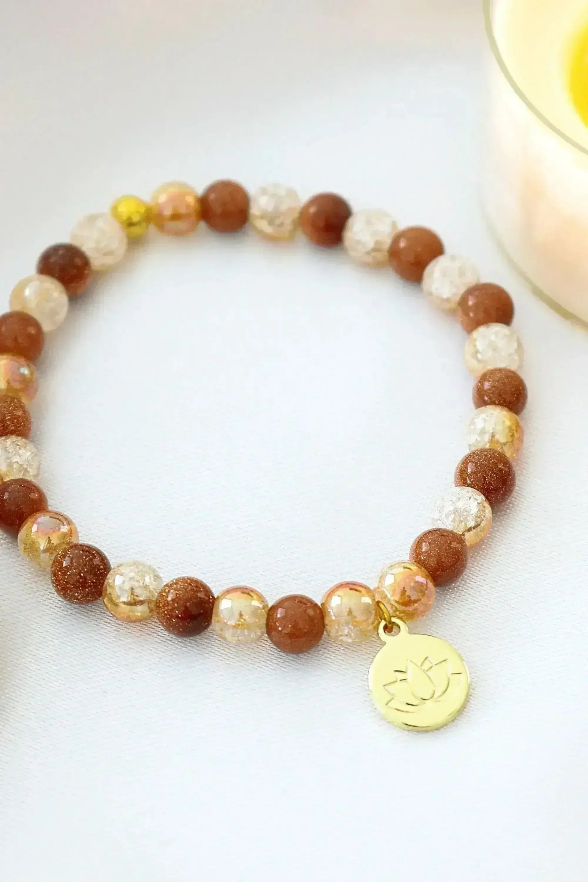 Goldstone Elastic Bracelet | 24K Lotus Flower Charm - Femstylo
