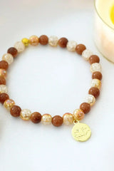 Goldstone Elastic Bracelet | 24K Lotus Flower Charm - Femstylo