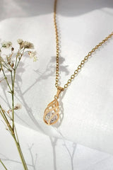 24 Karats Cubic Zirconia Tear Drop Cage Necklace - Femstylo